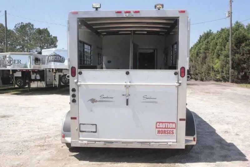 1999 Sundowner 20 ft Horse Trailer – Weekender – Rear view of horse trailer with upper door open showing interior