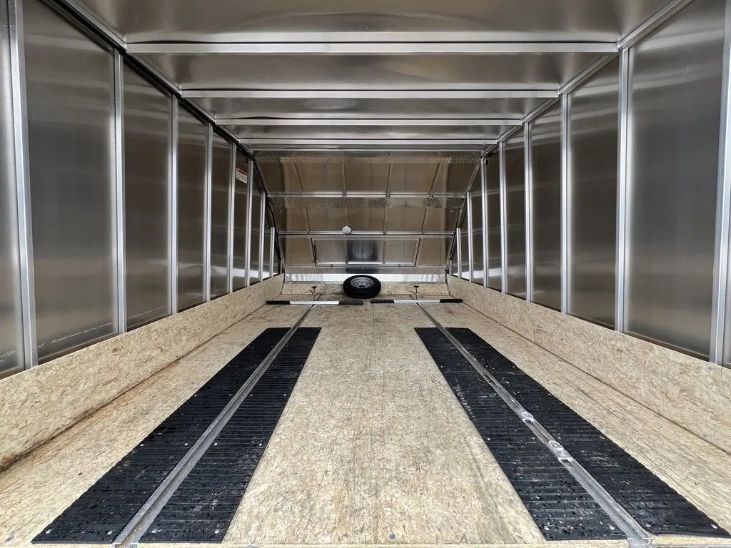 2022 High Country 12 ft Hybrid Trailer – Track Mats – Full interior view of the empty trailer showing the aluminum walls and wood floor