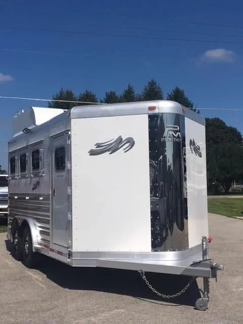 2018 Platinum Coach 3 Horse Bumper Pull – Rear Tack – Front view of the trailer focusing on the polished chrome front nose