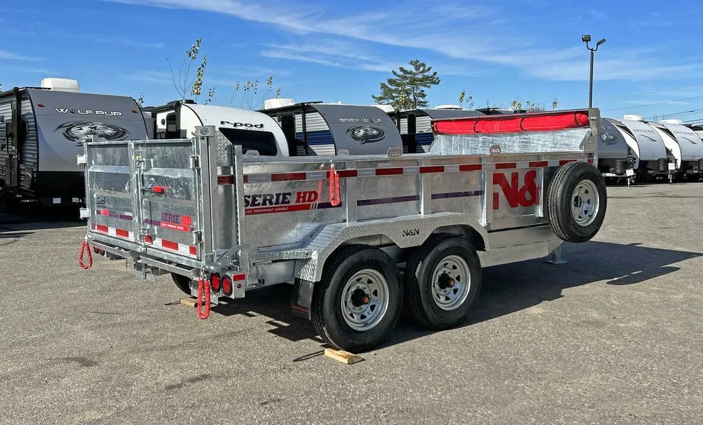 2024 N&N Trailers 14 ft Dump – Galvanized Steel – Rear three-quarter view with the barn doors closed showing the spreader gate