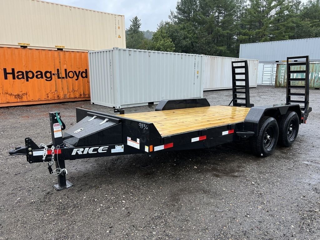 2024 Rice Trailers 16 ft Equipment Trailer – Toolbox – Front three-quarter view of a black equipment trailer with a wooden deck and ramps