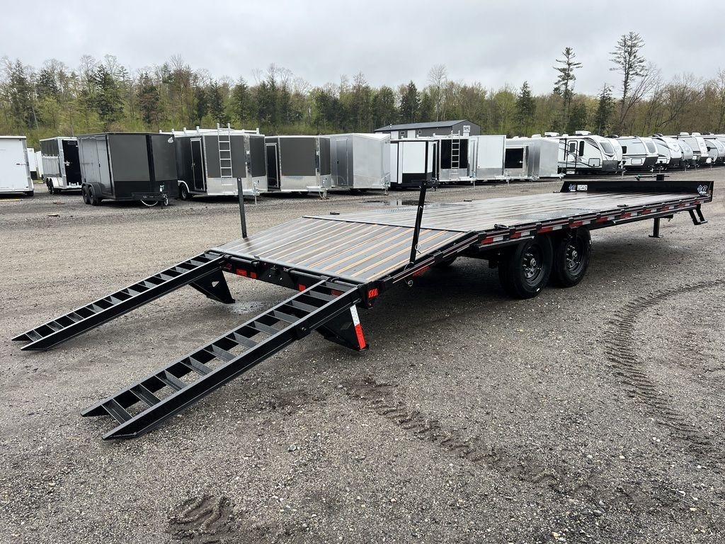 2024 Diamond C 24 ft Deckover – Blackwood Deck – Rear perspective view showing the long deck and extended ramps