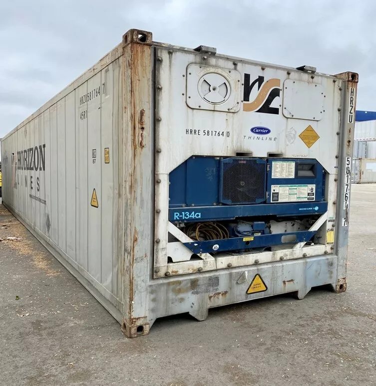 40ft High Cube Reefer Container – Non-Working, Insulated Storage – three-quarter exterior view of weathered refrigerated container with cooling equipment