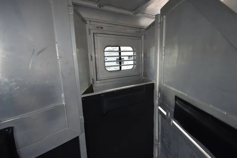 2008 C and C Trailers 4 Horse Bumper Pull – Hay Pod – View of the front horse stall area with a small drop down window