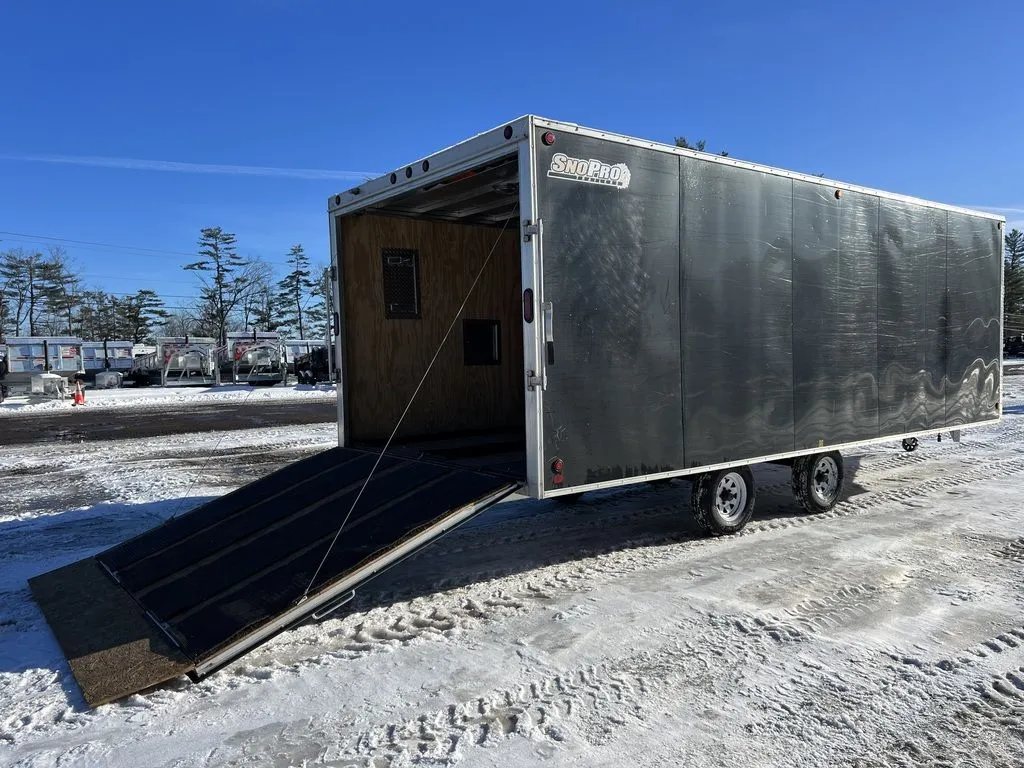 2008 Sno Pro 4-Place Snowmobile Trailer – Black Aluminum – Side and rear view with the back ramp door lowered