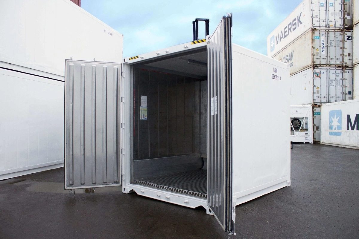 10ft Refrigerated Shipping Container – Compact Cold Storage – White refrigerated container with both doors open, showing metal interior and ribbed floor