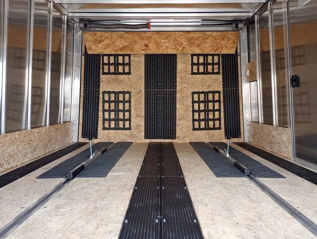 Mission Trailers Aluminum Crossover – Rear Canopy – View looking into the trailer interior showing the front access door area