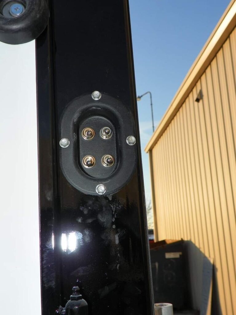 2022 Double D 2 Horse Bumper Pull – Reverse Slant – Close up of electrical toggle switches mounted on black frame