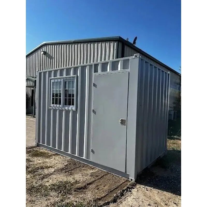 12 ft Modified Container – Gray, Window And Door – Angled exterior view of a grey modified shipping container with window and door