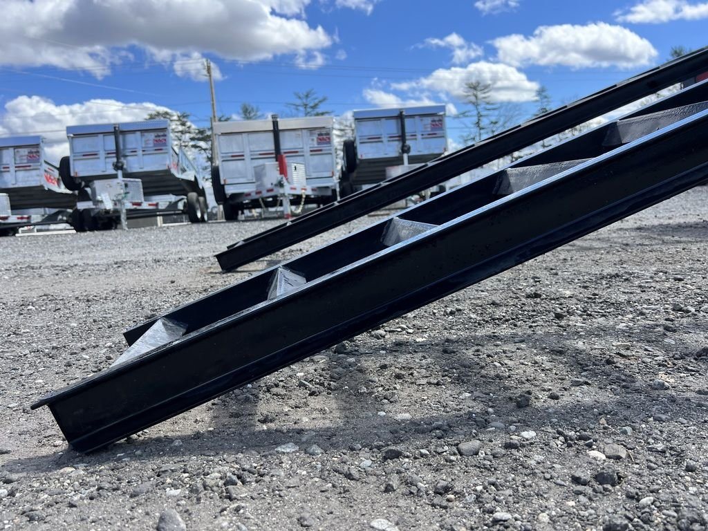 2023 Big Tex 40 ft Equipment Trailer – Slide-Out Ramps – Low angle close-up of the steel ladder-style slide-out ramp construction