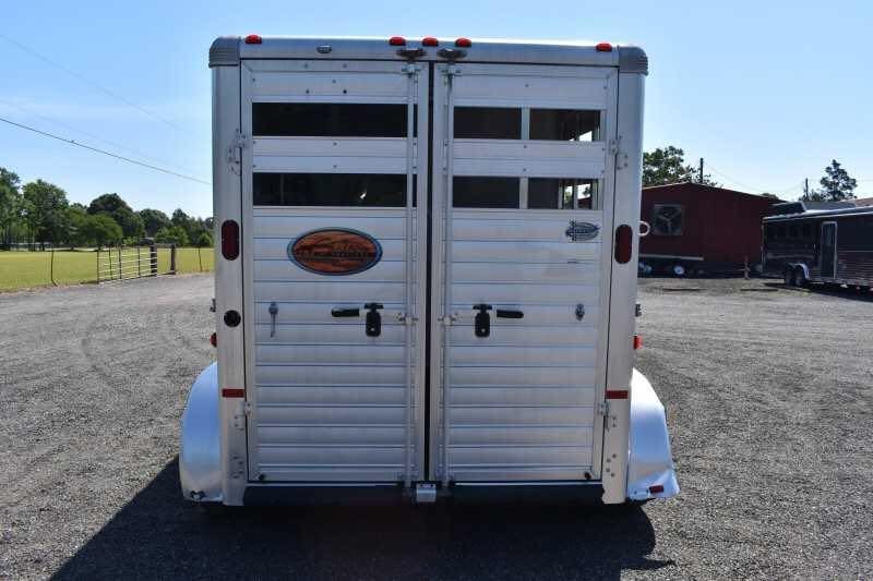 2014 Sundowner 2 Horse Gooseneck Trailer – Electric Jack – Rear view of the closed double doors of the silver horse trailer