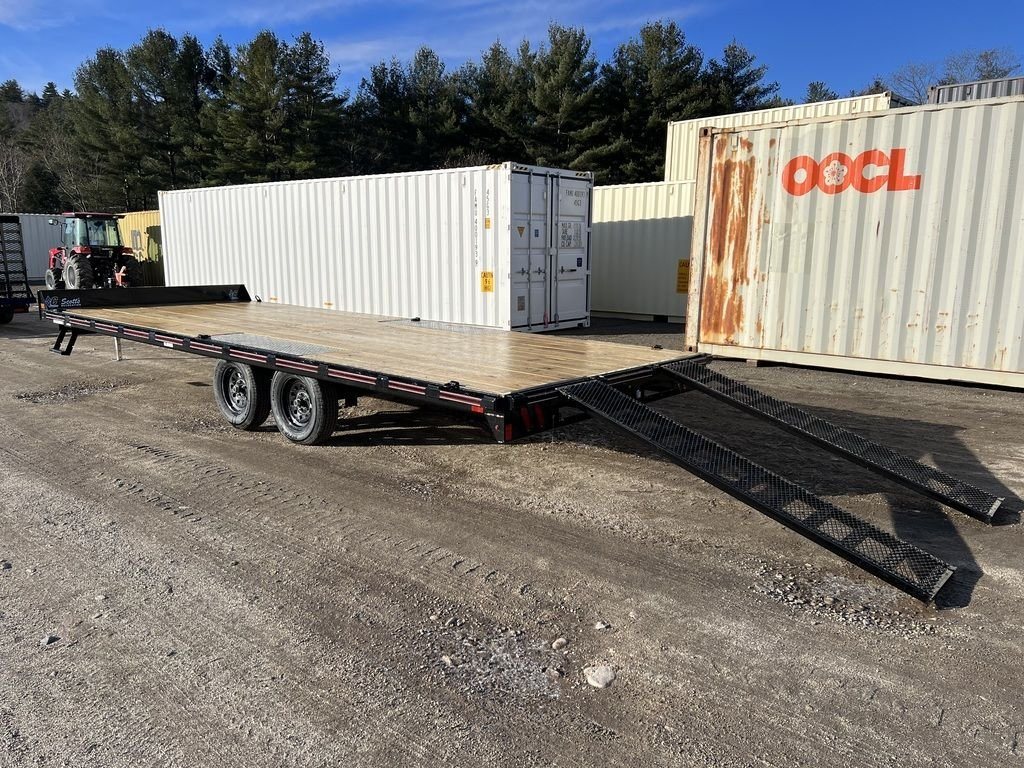 2024 Diamond C 22 ft Deckover Trailer – Slide-In Ramps – Rear three-quarter view of the trailer with loading ramps fully extended