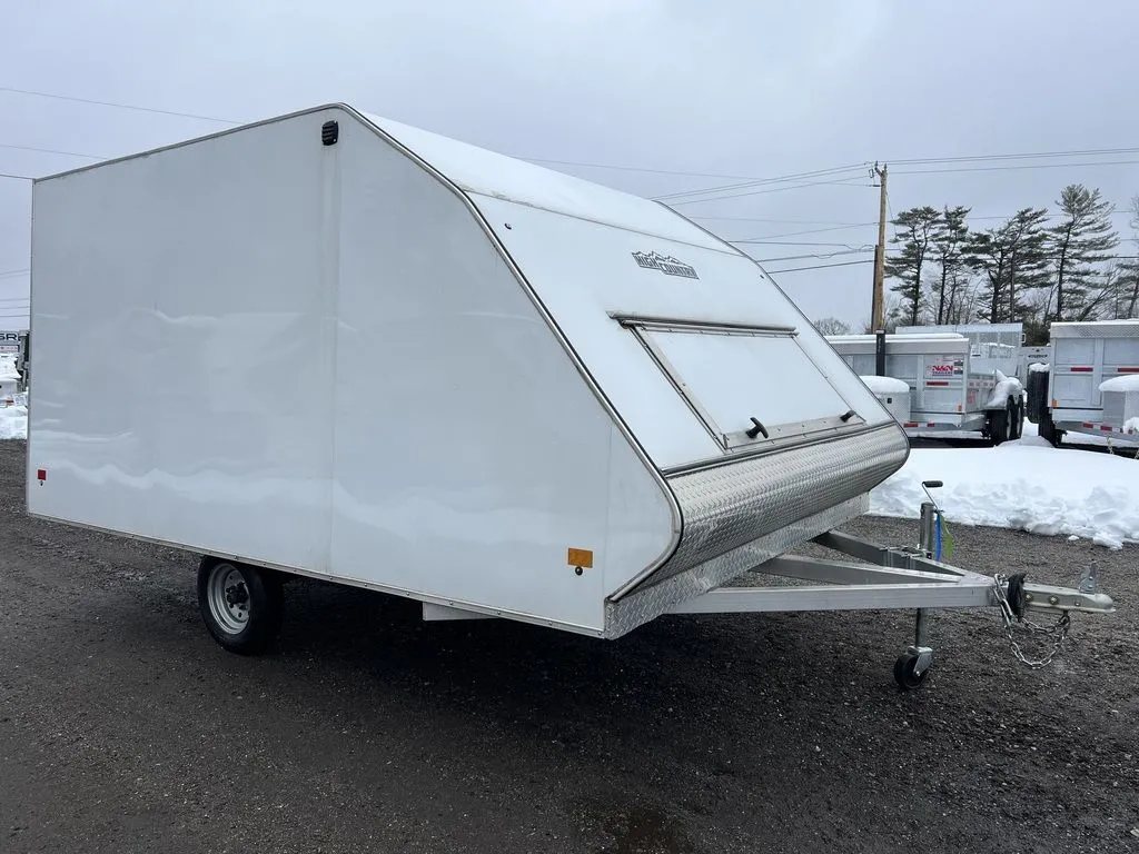 2022 High Country 12 ft Hybrid Trailer – Track Mats – Front three-quarter view from the right side of the white enclosed trailer