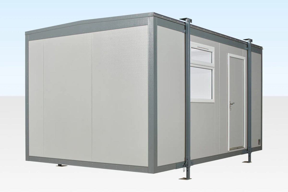 16 ft Jackleg Office Cabin – Open Plan – Exterior three-quarter view of a grey modular office cabin with a window and door