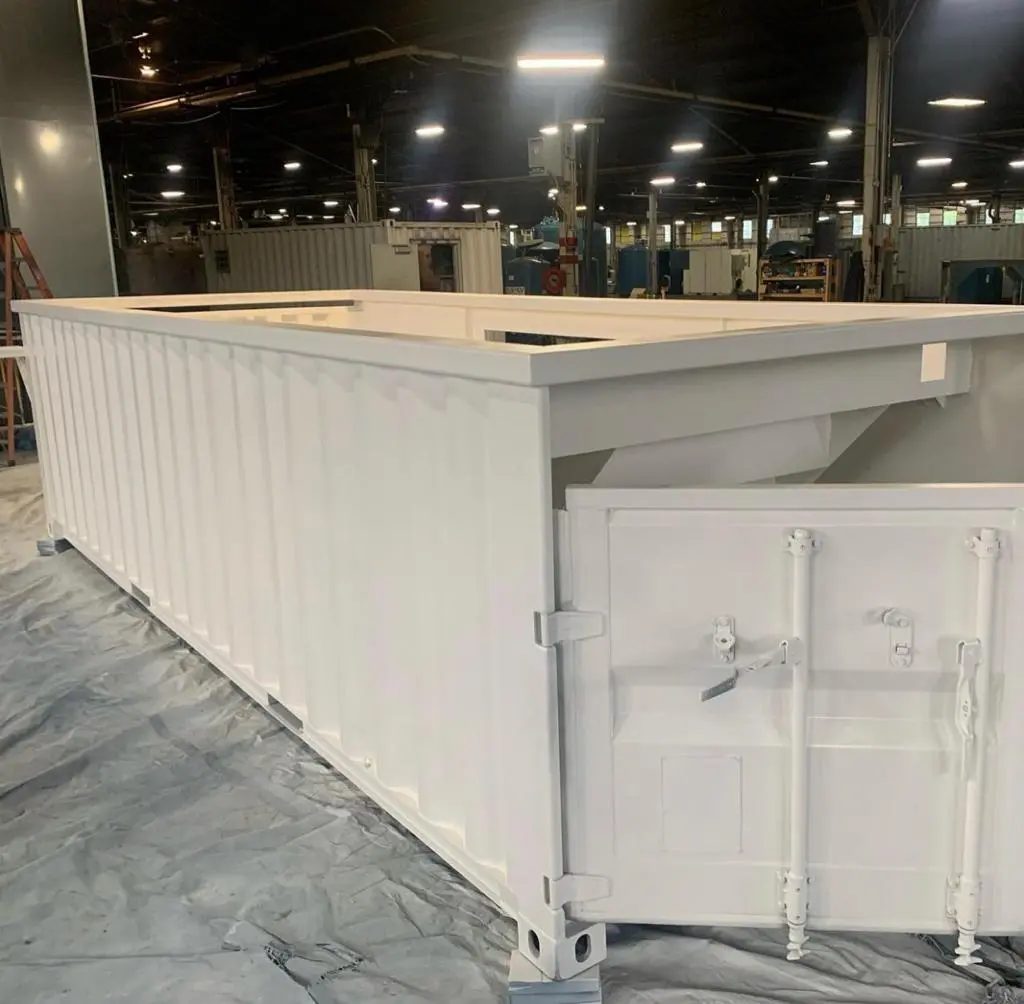 30ft Custom Container Pool – Configurable Finishes – white container pool shell with cargo door in workshop