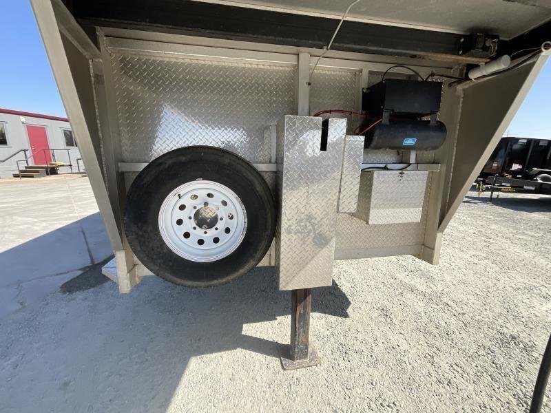 2005 Jamco 4 Horse Gooseneck Trailer – Blue, Air Suspension – Gooseneck hitch area with spare tire and storage boxes