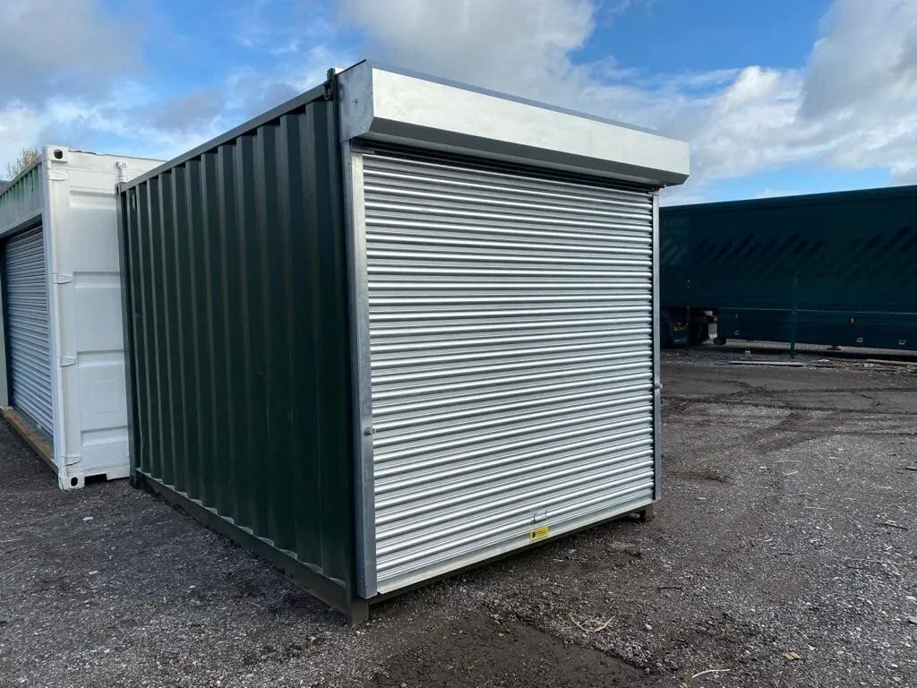 15ft Steel Shipping Container – Anti-Condensation Coating – three-quarter exterior view with closed silver roller shutter (3)