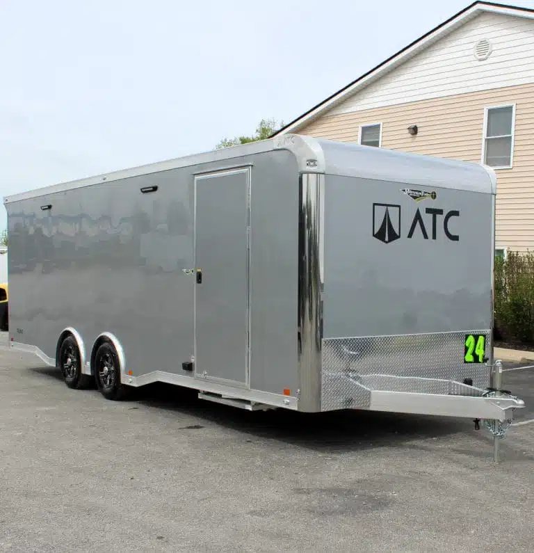 2026 ATC 24 ft Car Trailer – Silverfrost, Plus Package – Side profile showing the entry door and black aluminum wheels