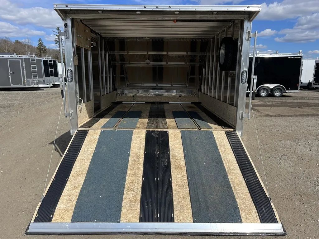 2023 Sno Pro 2-Place Snowmobile Trailer – Galvanized Package – Ground level straight-on view of the open ramp and trailer interior