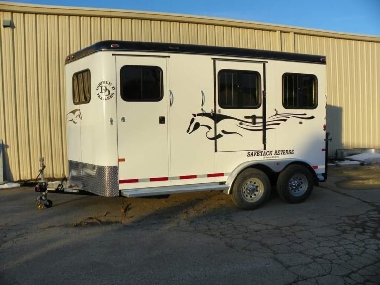 2022 Double D 2 Horse Bumper Pull – Reverse Slant – Full side view of white horse trailer with black graphics and black roof
