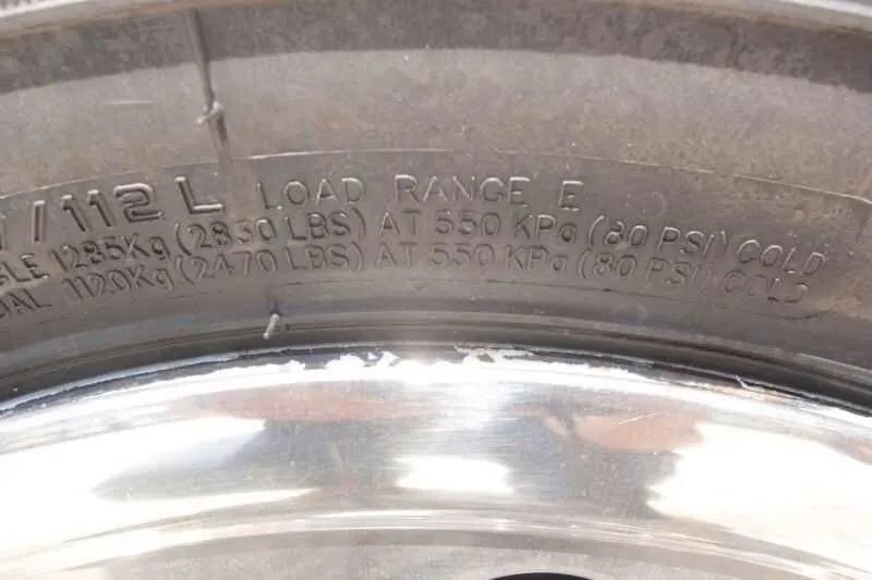 1999 Sundowner 20 ft Horse Trailer – Weekender – Close up of tire sidewall information showing load range and pressure