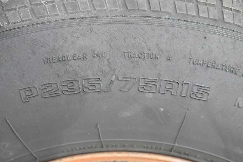 2001 CM Odyssey 2 Horse Trailer – Aluminum Floor – Macro shot of the tire sidewall indicating the tire size specifications
