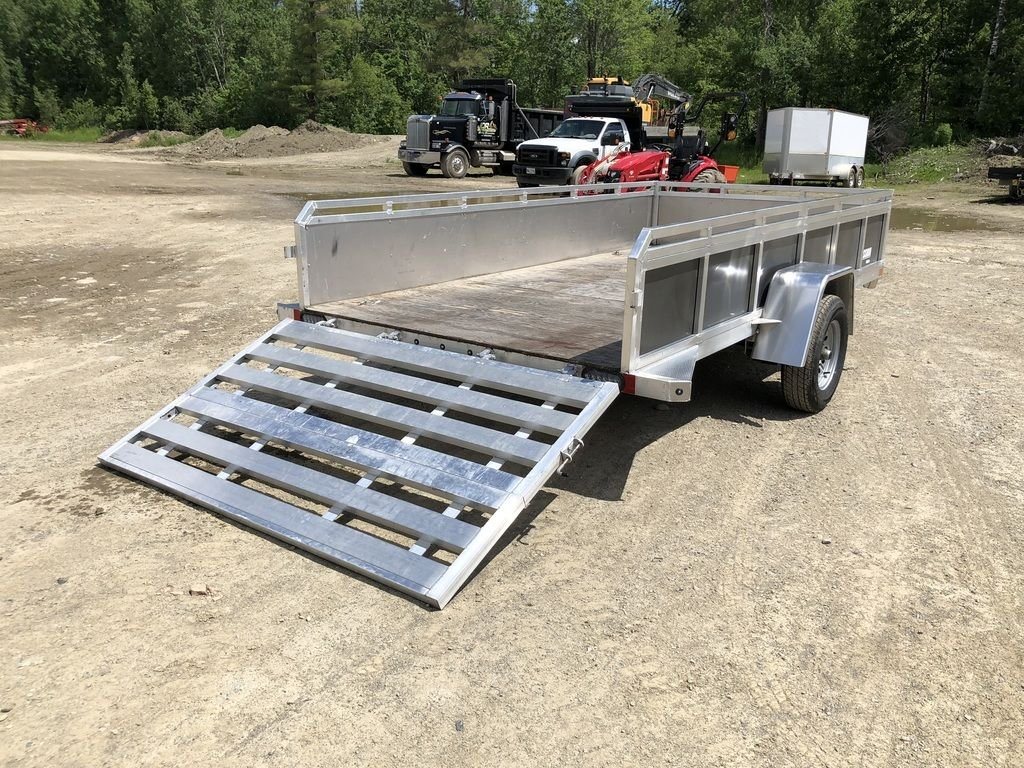 2022 Mission 6 × 12 ft Utility Trailer – Rear Ramp – Rear three-quarter view showing the integrated aluminum ramp lowered to the ground