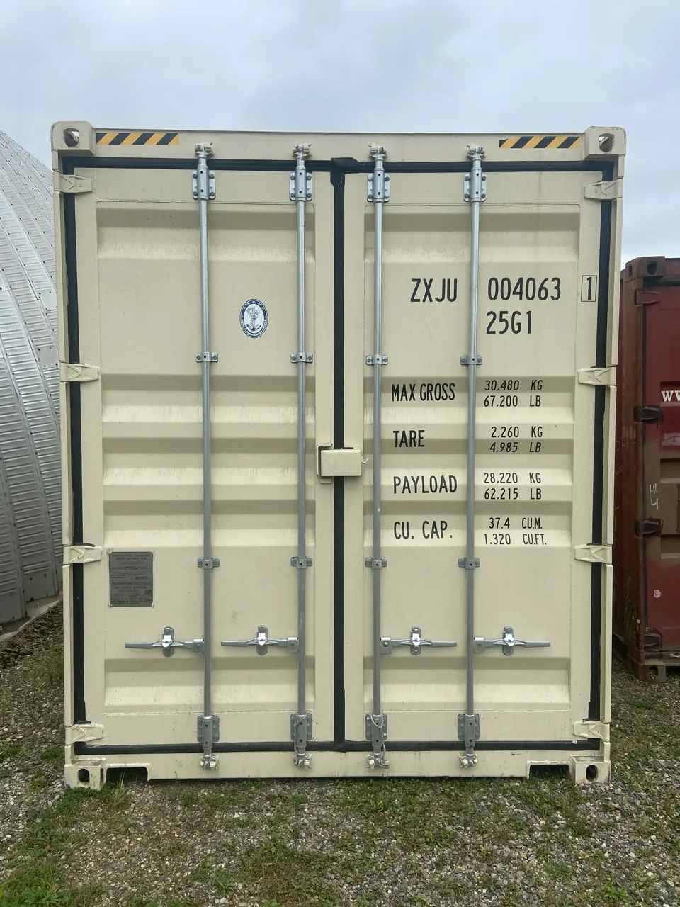 20ft High Cube Shipping Container – One-Trip, Extra Height – straight-on view of closed container doors and locking bars