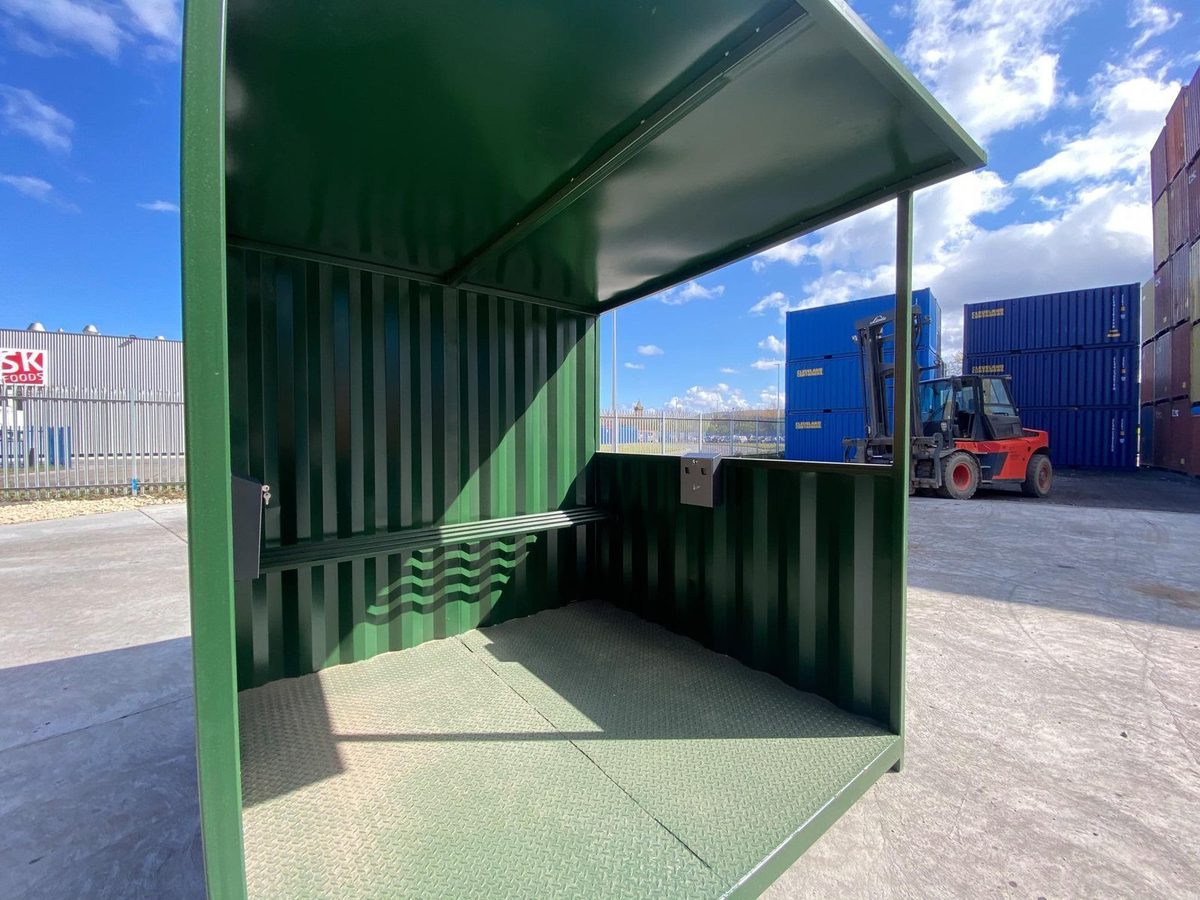 5ft × 8ft Steel Smoking Shelter – Ventilated, Lockable Enclosure – open green smoking shelter with bench and wall ashtrays