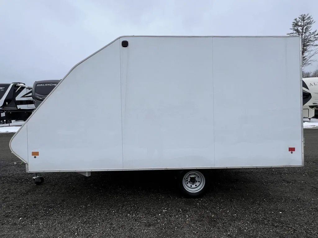 2022 High Country 12 ft Hybrid Trailer – Track Mats – Profile side view from the left showing the single axle and white skin