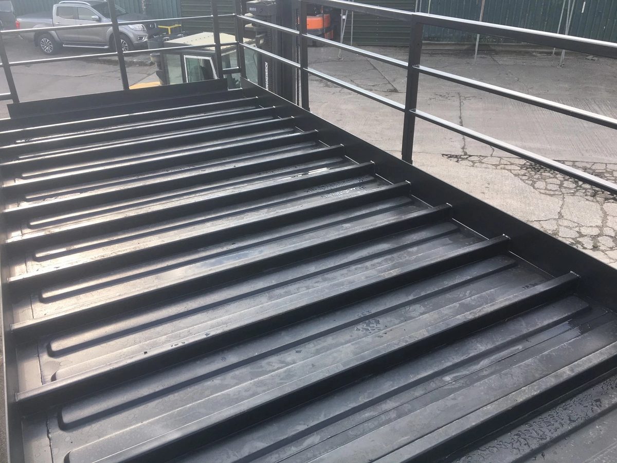 20ft Converted Shipping Container – Serving Hatches and Roof Deck – black corrugated container roof with metal safety railings