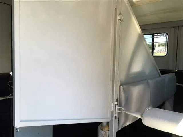 2007 Hawk 2 Horse Bumper Pull Trailer – Side Ramp – Interior stall partition and padding inside the horse trailer