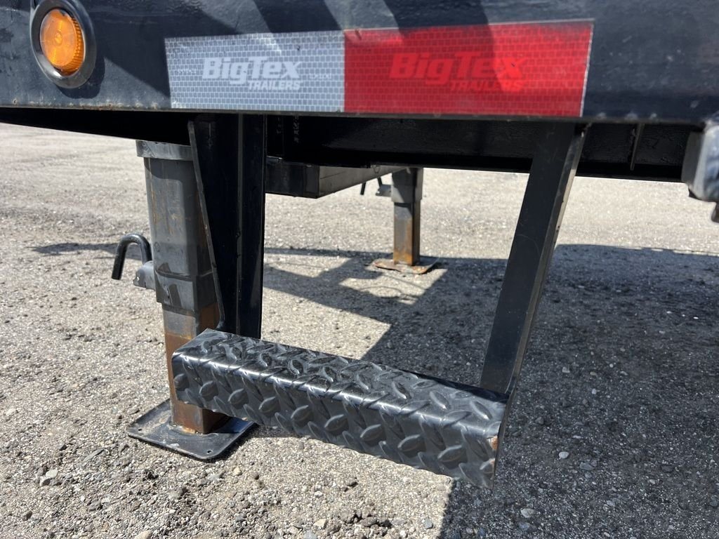 2023 Big Tex 40 ft Equipment Trailer – Slide-Out Ramps – Detail shot of a side step and reflective tape on the trailer frame