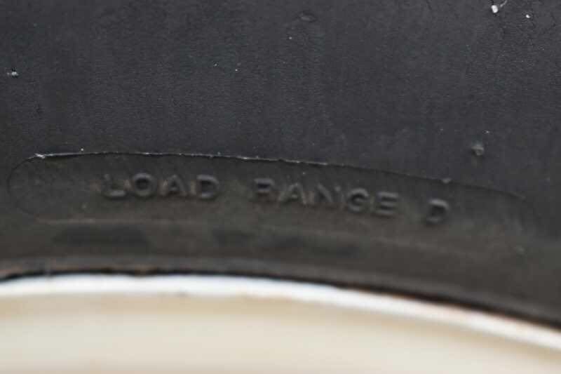 2005 Sundowner 2 Horse Trailer – Sunlite Straight Load – Close up detail of tire load range marking on the rubber