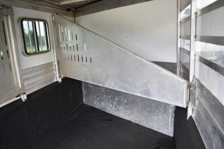 2012 CM 3 Horse Bumper Pull Trailer – Aluminum, Hayrack – View of an aluminum horse stall divider inside the trailer