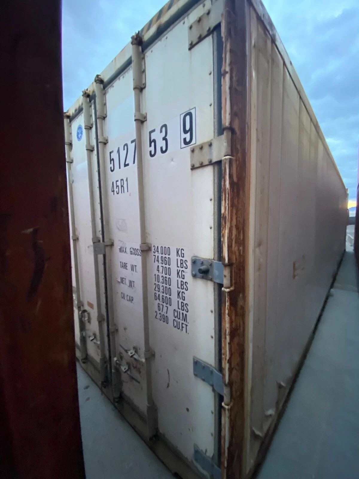 40ft Used Reefer Container – Non-Working Insulated Storage – Closed refrigerated container doors and side in narrow aisle