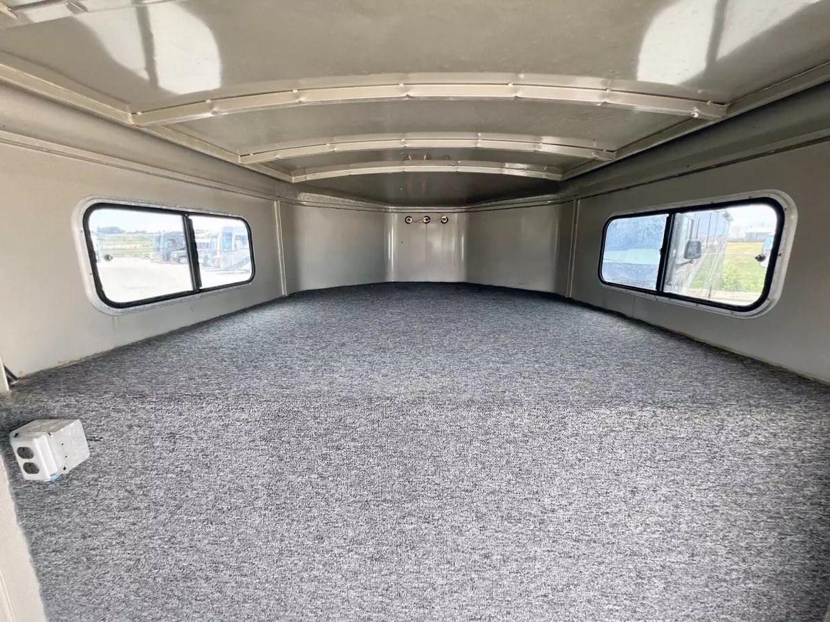 2001 Titan 3 Horse Gooseneck Trailer – Steel, Dressing Room – The carpeted sleeping area inside the gooseneck portion of the trailer