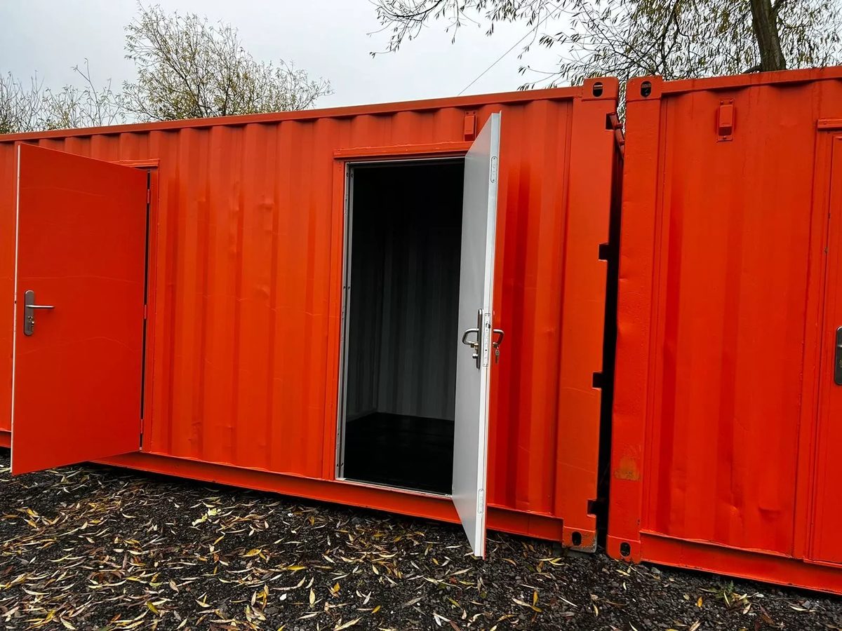 40ft Multi-Compartment Shipping Container – Individual Side Access – orange storage container with multiple side entry doors open