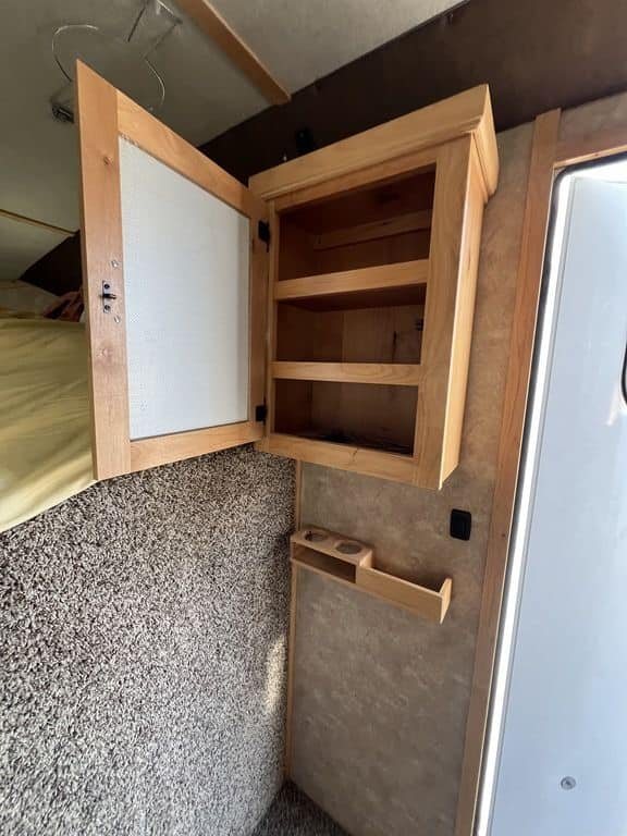 2020 Trails West Sierra 4 Horse Gooseneck – Comfort Package – Wooden upper cabinet and cup holder inside the living quarters