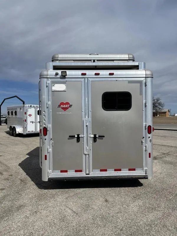 2016 Hart Ultimate 4 Horse Trailer – Champagne, Hay Pod – Straight on rear view of the trailer double doors with a small window