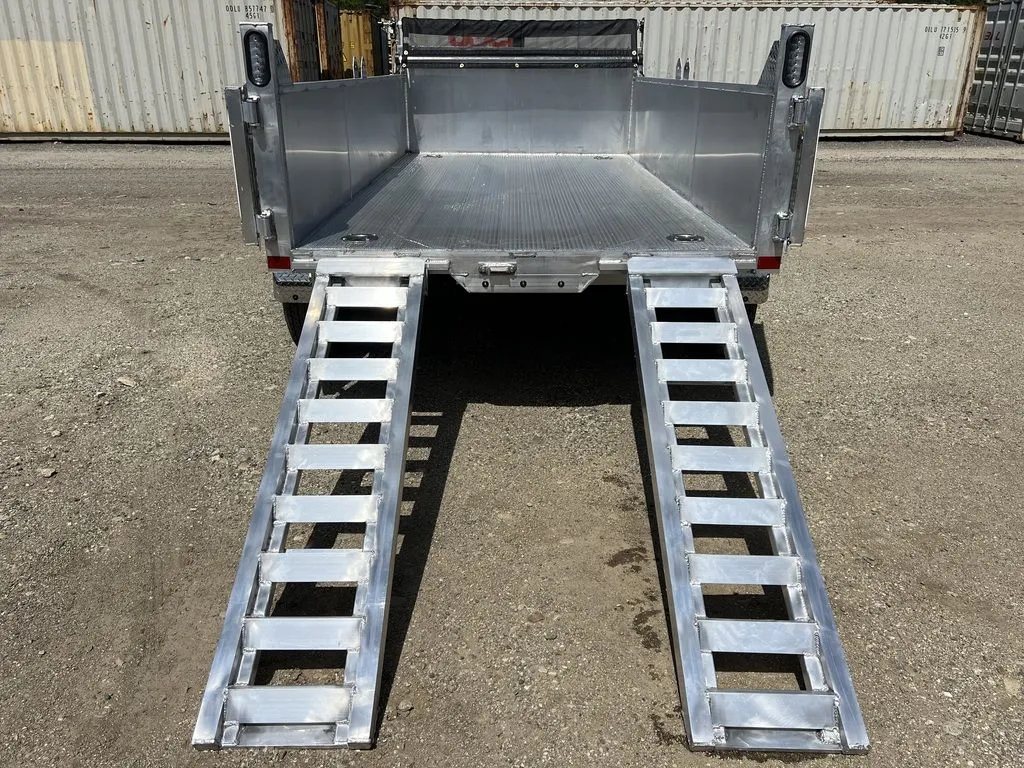 2024 Cargo Pro 12 ft Dump Trailer – Aluminum – Rear view of the trailer with two aluminum loading ramps deployed