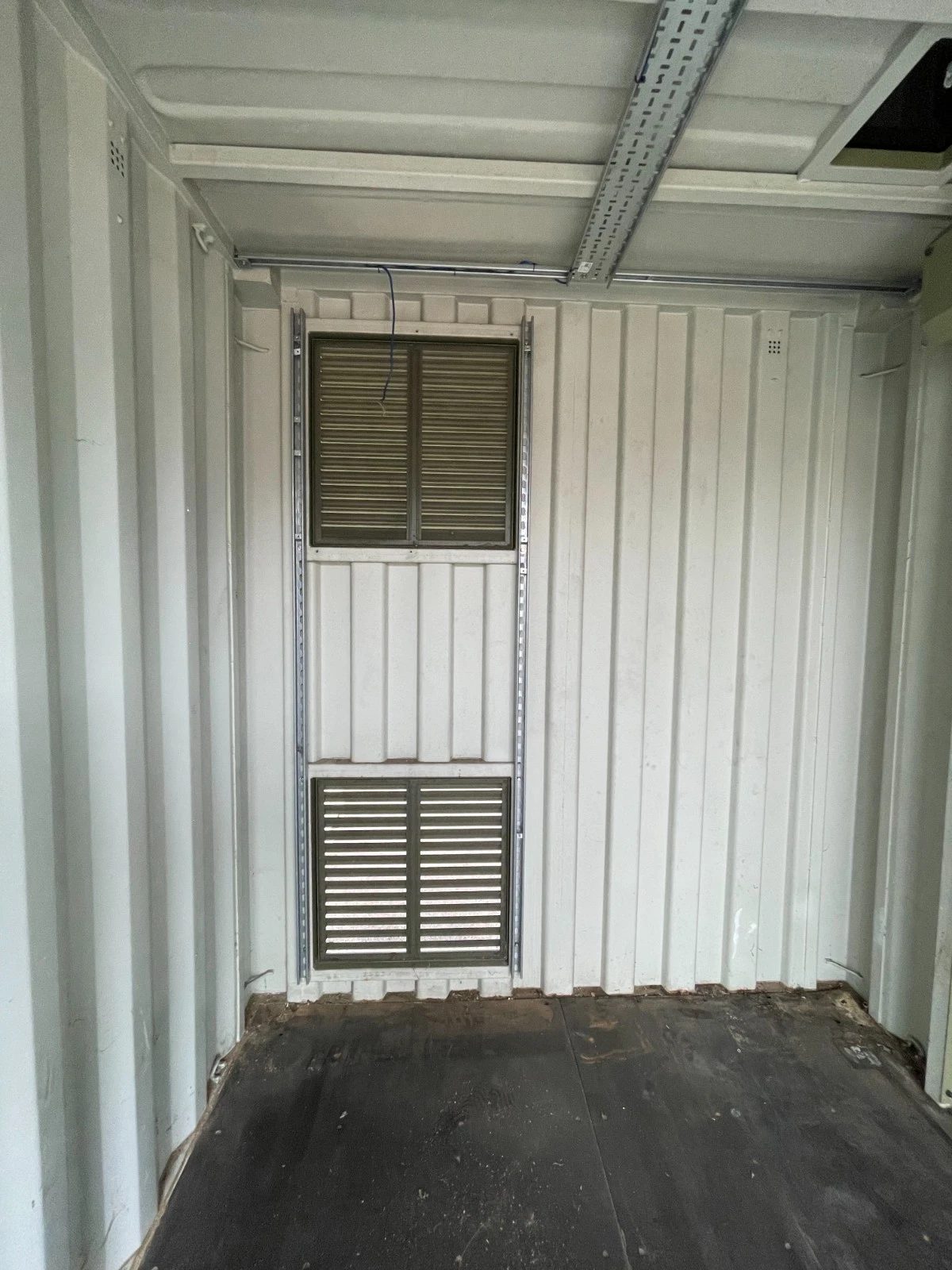 13ft Used Shipping Container – Lock Box Storage – empty container interior with wall vents and overhead cable tray