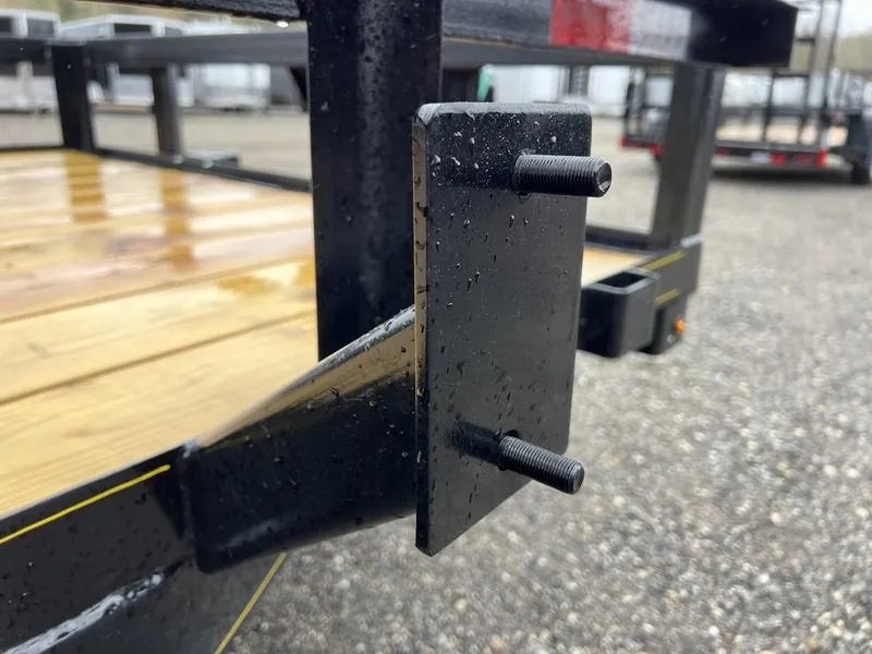 2024 Reiser Trailers 12 ft Landscape Trailer – Ramp Gate – Close-up of a black metal bracket mounted on the side of the trailer frame