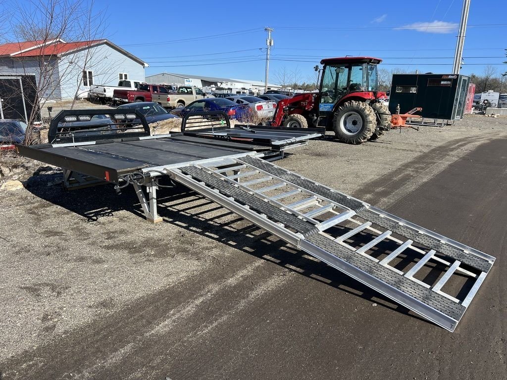 2023 Sno Pro 8 ft Sled Deck – Sliding Sides – Wide angle shot of the sled deck with ramp deployed in lot