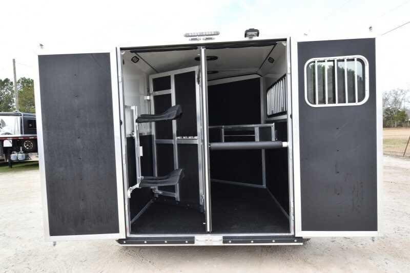 2016 Shadow 2HBP 2 Horse Bumper Pull Trailer – Aluminum – Rear of white horse trailer with double doors open showing interior stall