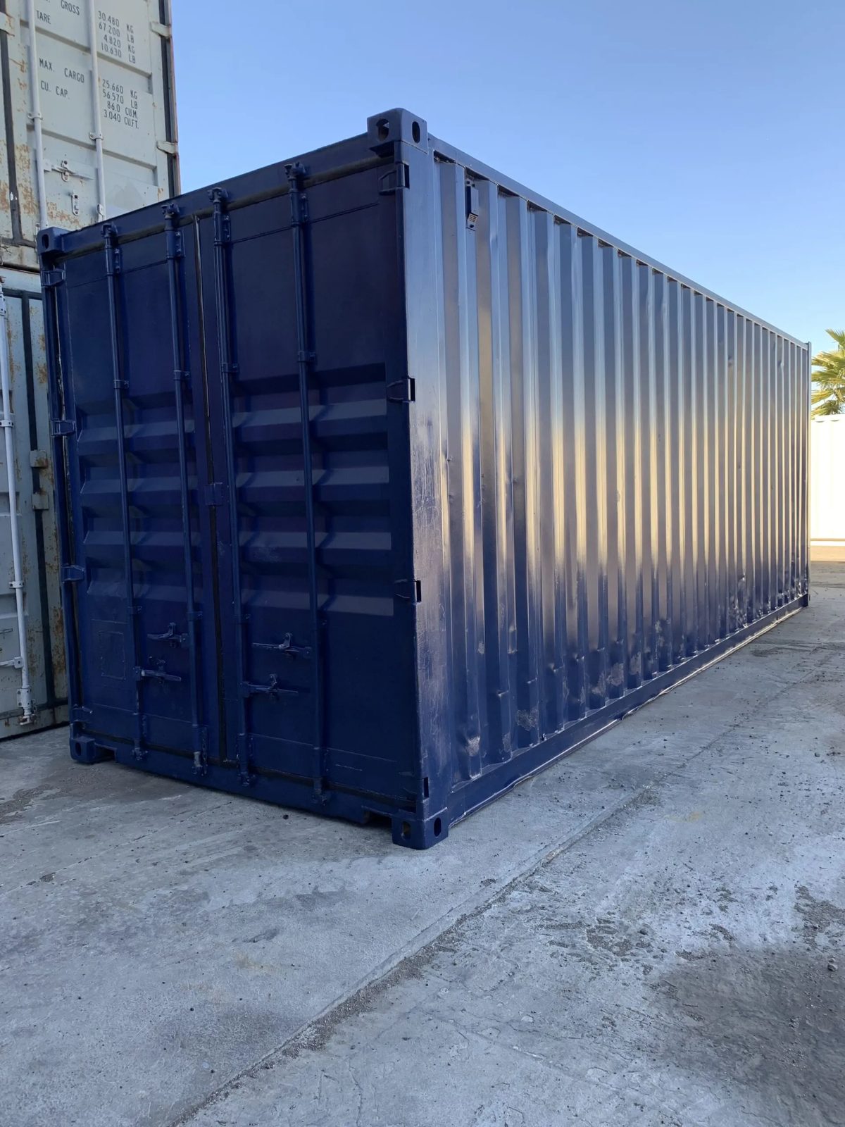 30ft Modified Storage Container – Roll-Up Access – three-quarter exterior view with cargo doors closed