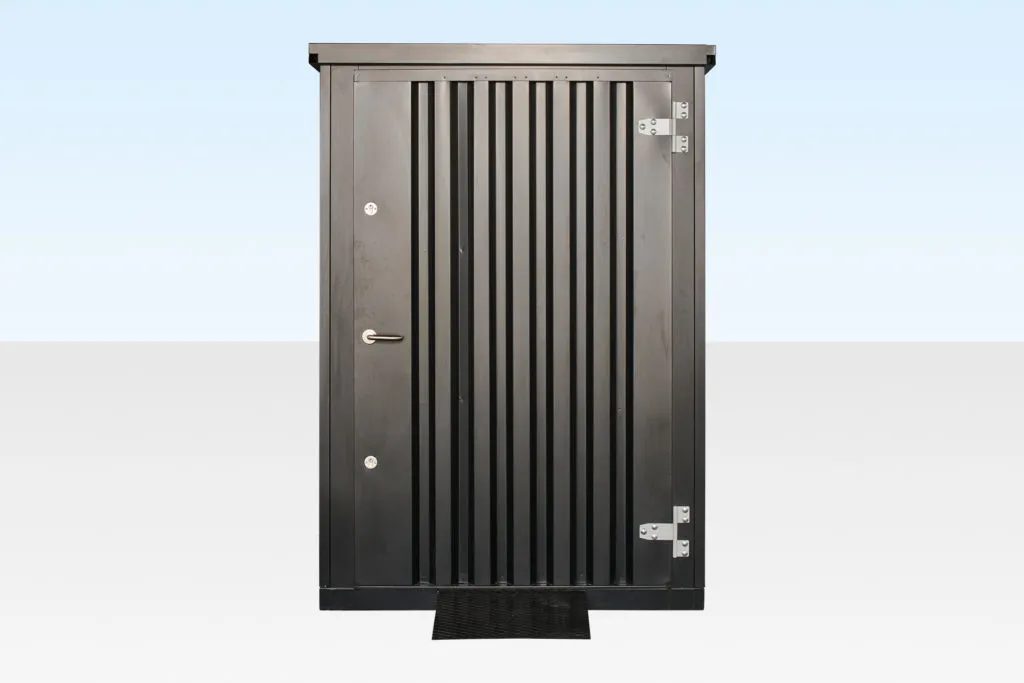 Flat Pack Steel Garden Store – Shelving And Retractable Ramp – front view of steel storage shed with closed door