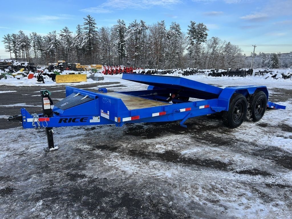 2024 Rice Trailers 20 ft Tilt Trailer – Spare Mount – Blue flatbed trailer with its tilt deck partially raised, shown from a three-quarter angle