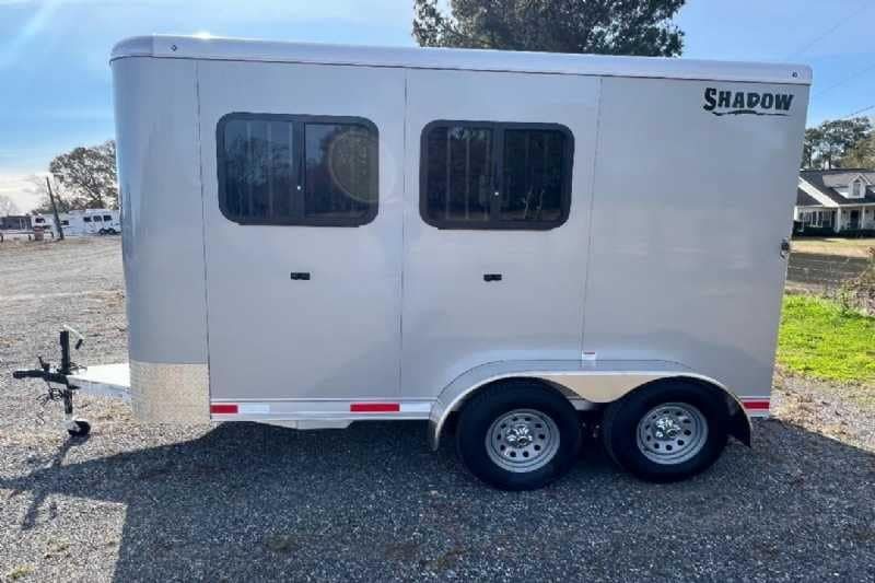 2024 Shadow 2 Horse Bumper Pull Trailer – Aluminum, Dressing Room – Side exterior view featuring drop down windows with protective bars