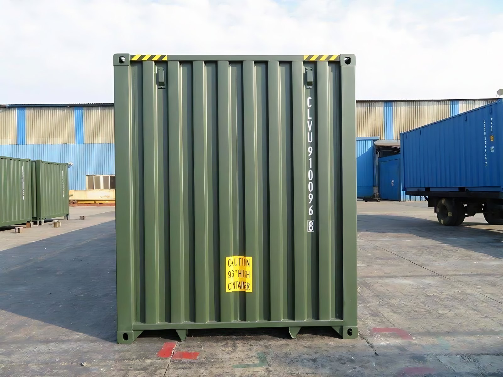 40ft One-Trip Shipping Container – Standard Height, Dry Storage – straight-on view of green container closed end in yard